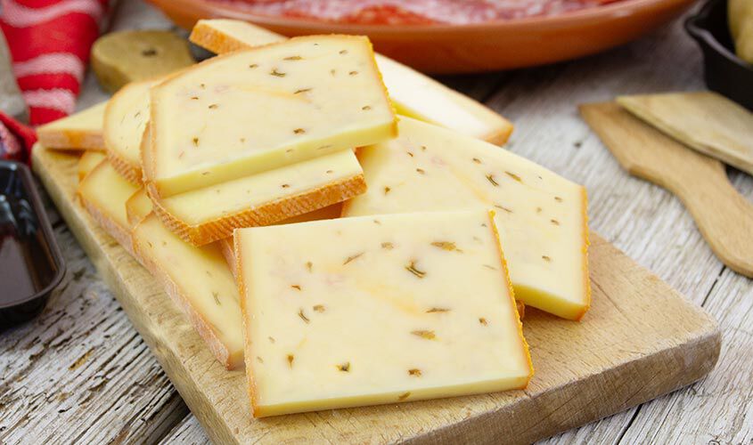 Formaggio - 40% Schweizer Raclette Kräuter, in Scheiben