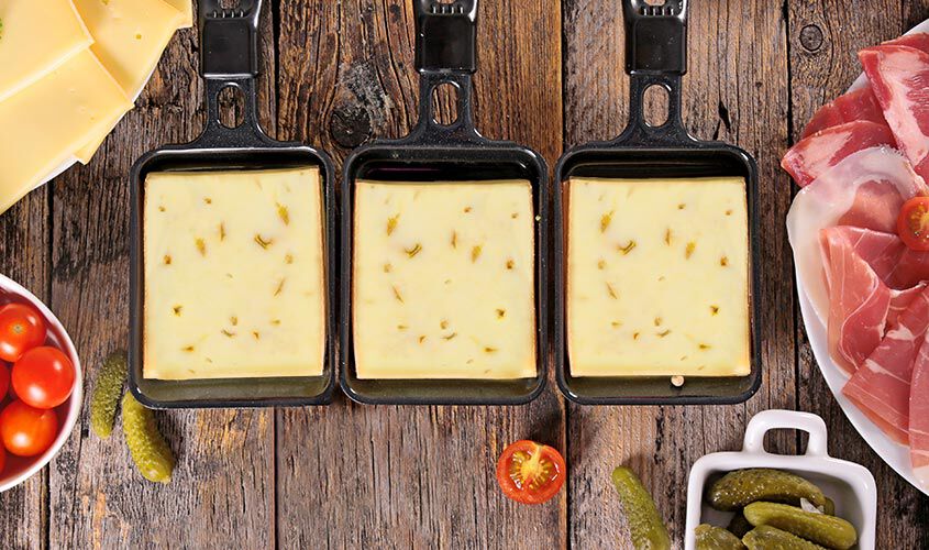 Formaggio - Fromage à raclette suisse fines herbes, en trances