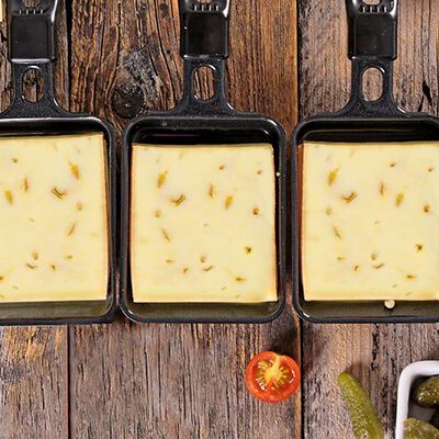 Formaggio - Fromage à raclette suisse fines herbes, en trances